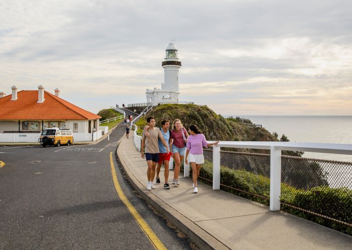 Friends walking along the path from the Cape Byron Lighthouse, Byron Bay