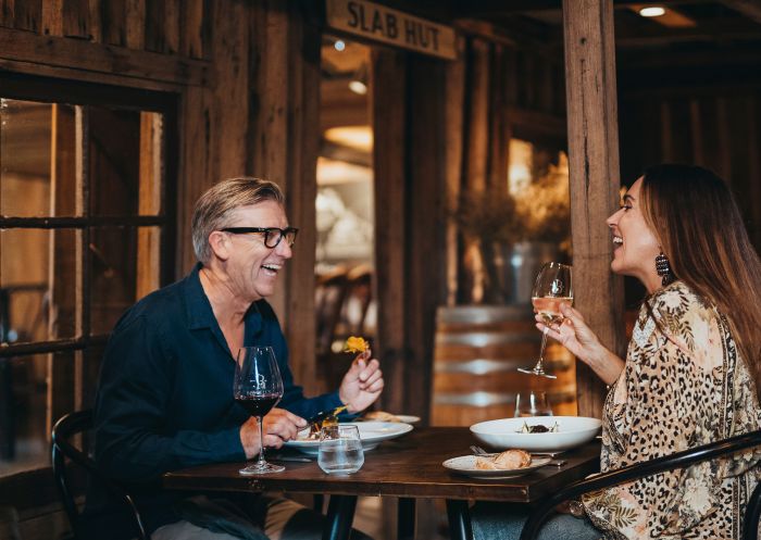 Couple enjoying food and drink at Boydell's restaurant, Morpeth