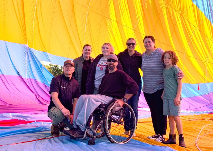 Family with man in wheelchair getting ready for Balloon Aloft adventure, Hunter Valley
