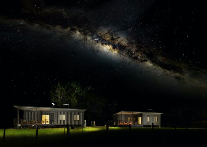 Shipping container cabins under the nightsky at Contained In Nimbin Accommodation, Nimbin 