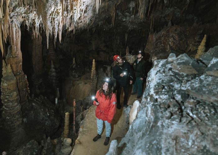 Couple touring the Yarrangobilly Caves, Kosciuszko National Park
