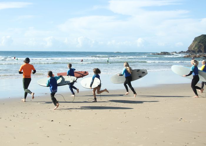 People learning to surf at Port Macquarie Surf School at Flynn's Beach, Port Macquarie