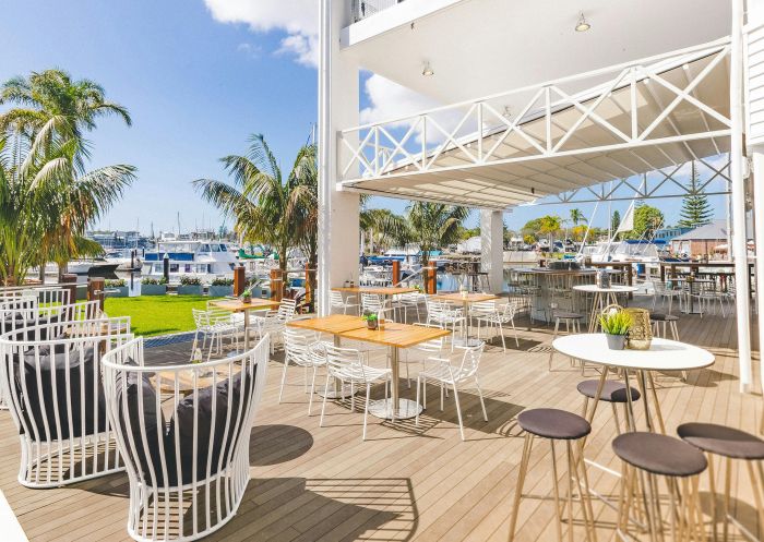 Outdoor dining by the marina at The Boathouse Bar and Restaurant, Port Macquarie