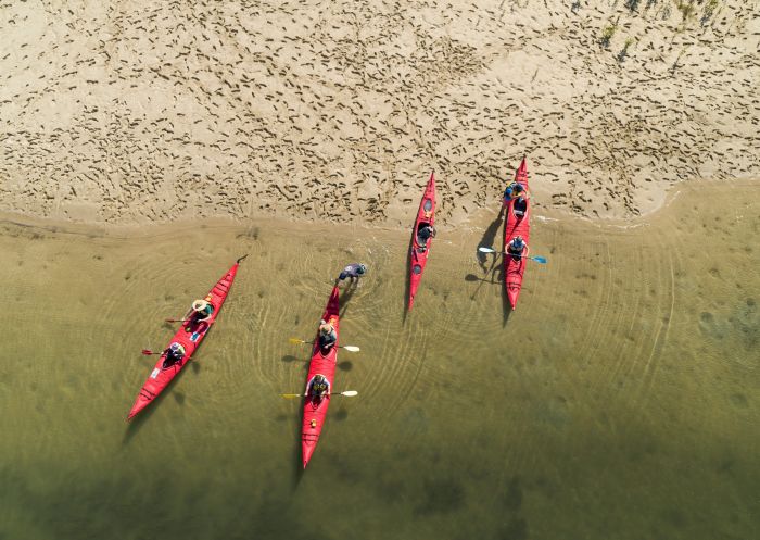 Aerial view Clarence River with red kayaks, Yamba Kayaks, Yamba