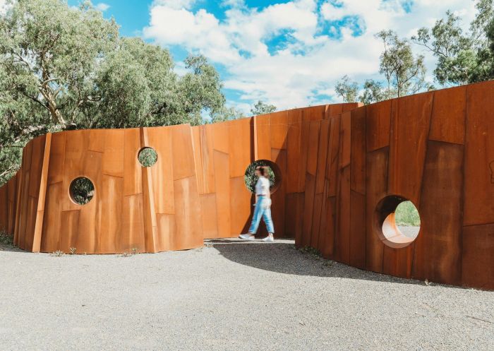Woman walks through Wandering sculpture, Sculpture Down the Lachlan, Forbes - Credit: Monique Lovick | hotography Forbes Arts Society