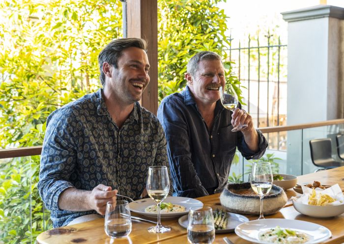 Friends enjoying food and drink at Limone Dining, Griffith