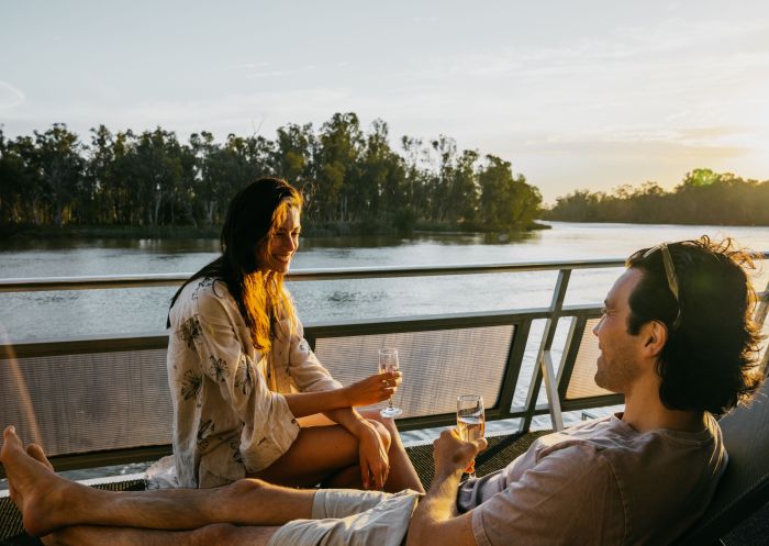 Couple enjoying an All Seasons Houseboat on the Murray River, Mildura