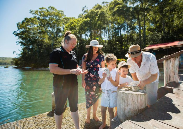 Family enjoying a visit, The Oyster Shed, Batemans Bay