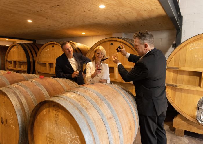 Guest enjoying wine, Pooles Rock Cellar Door, Pokolbin