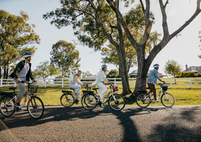 Young people enjoying a bike ride, Sutton Estate Electric Bike Hire, Sutton Estate, Hunter Valley