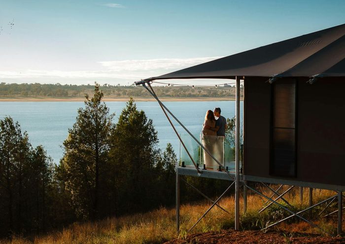 Couple on balcony, Wilderluxe - Lake Keepit, Keepit - Credit: Reflections Holidays | Paul Lojszczyk