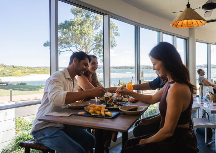 Friends enjoying food and drink, Spice Monkey, Forster