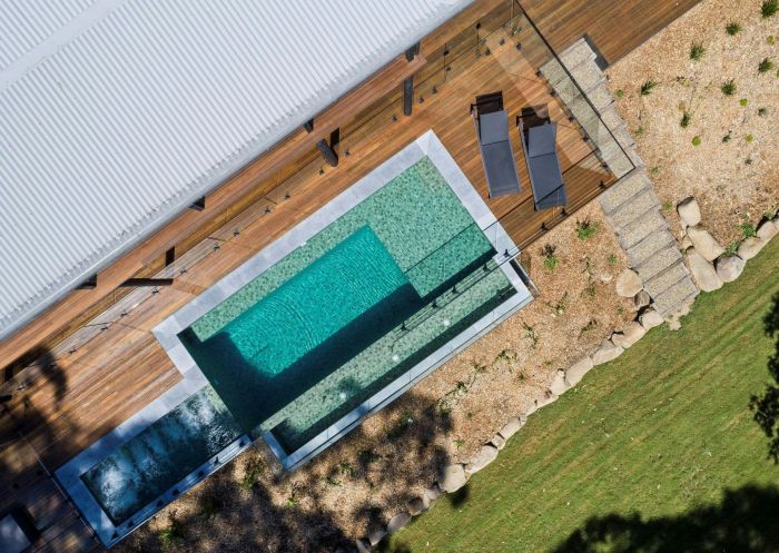 Sun soaked pool deck, Eucalypt Retreat, Conjola - Credit: Nathan Devine