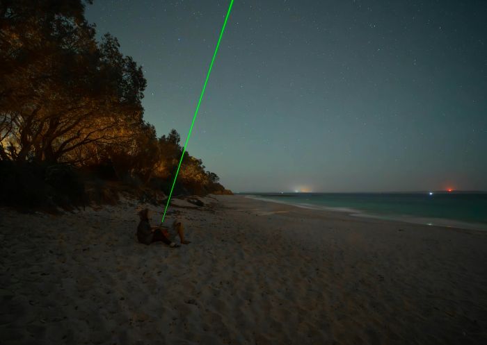 Couple stargazing on a beach, Jervis Bay Stargazing, Vincentia - Credit: Thomas Kirkpatrick