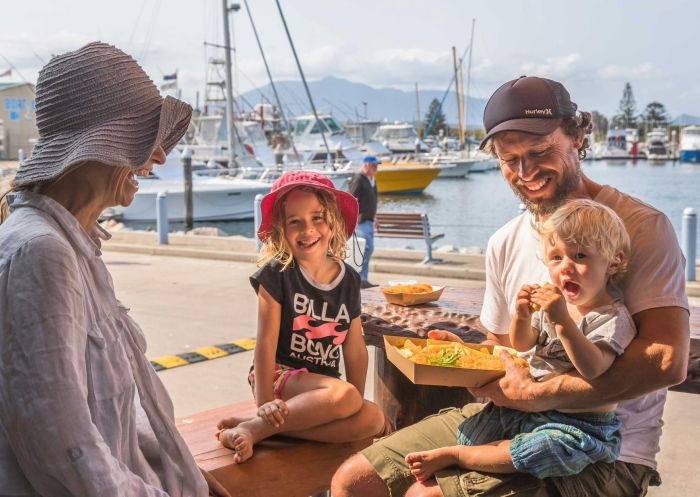 Family eating chips, Blue Wave Seafood, Bermagui - Credit: David Rogers | SCDM