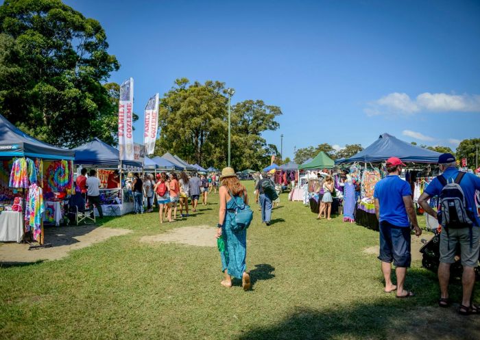 market stalls with people shopping, Huskisson Market, Huskisson- Credit: Katie Rivers