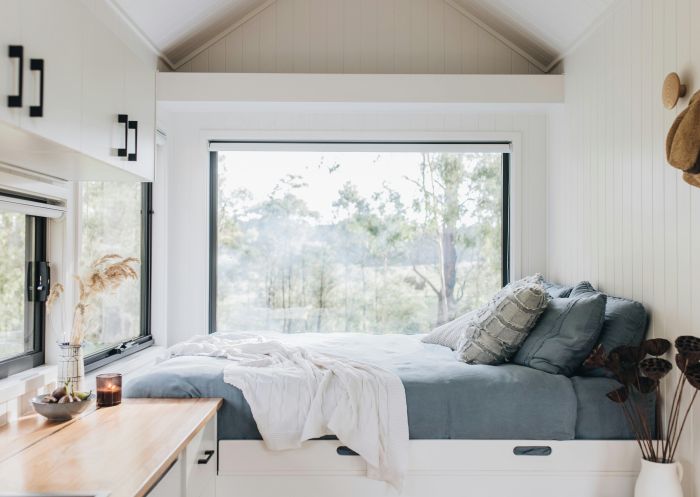  Queen bed overlooking surrounding bushland, Wildernest T2 Tiny House, Wingello - Credit: Abbie Melle