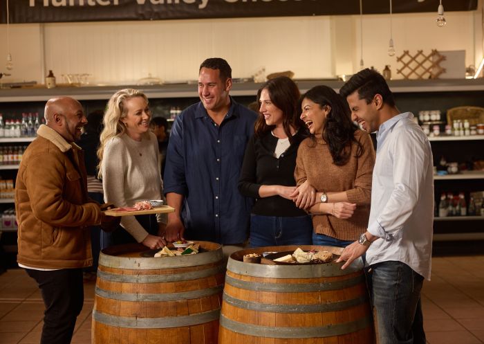 Friends enjoying a cheese tasting experience at, Hunter Valley Cheese Factory, Pokolbin