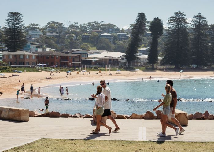 Visitors enjoying a walk, Avoca Beach, Avoca