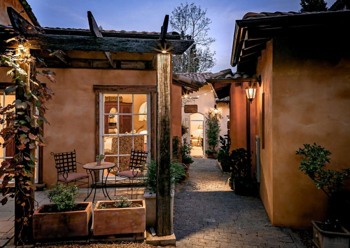 Outdoor exterior view of building with cosy lights, Guestlands Italia B&B, Arcadia - Credit: Guestlands Italia B&B