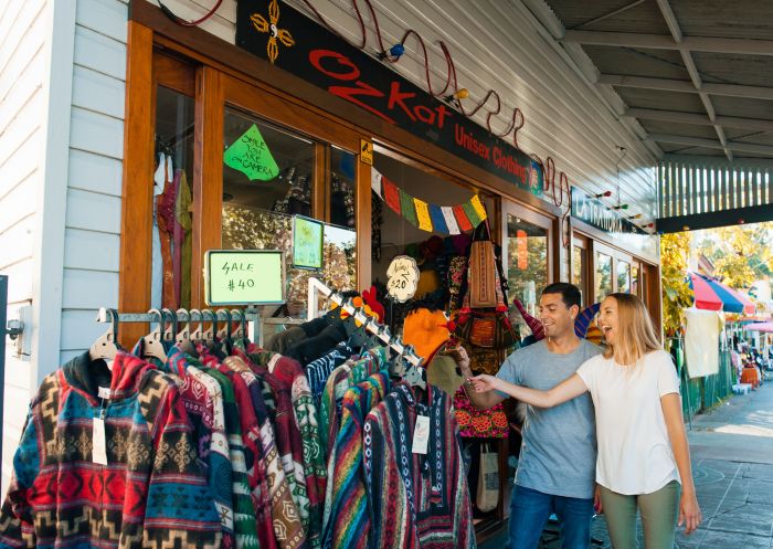 Couple enjoying a day of shopping for arts & crafts and local produce, Nimbin Market, Nimbin