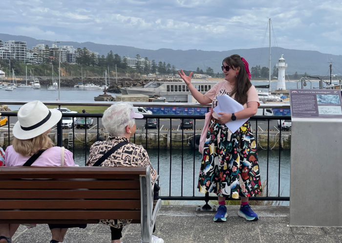 Woman leading a tour, She Shapes History, Wollongong