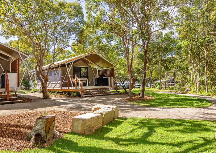 Exterior photo of glamping tent surrounded by bushland, Tweed Holiday Parks Pottsville North, Pottsville - Credit: Tweed Holiday Parks Pottsville North