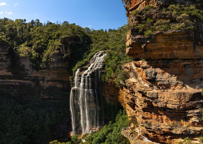 Beautiful waterfall on a sunny day on the Grand Cliff Top Walk, Wentworth Falls