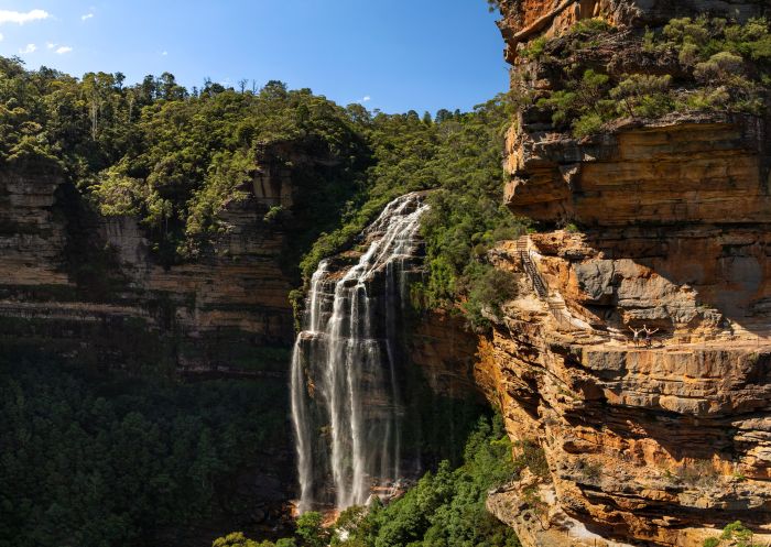 Beautiful waterfall on a sunny day on the Grand Cliff Top Walk, Wentworth Falls