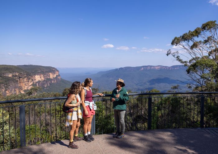 Visitors learn more about the incredible Grand Cliff Top Walk, Wentworth Falls