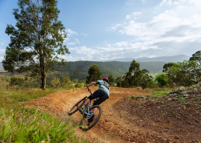 A mountain bike rider enjoying a bike track at Barrington Bike Park, Bindera