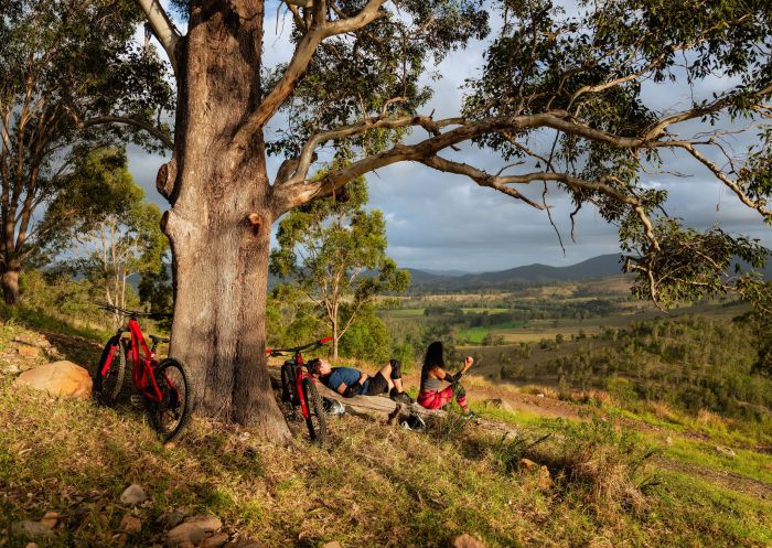 Couple enjoying a day mountain biking at Barrington Bike Park, Bindera