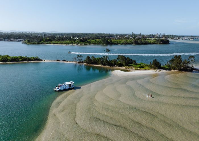 Aerial over the clear waters, Forster