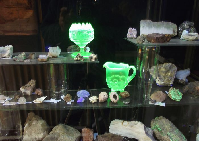 Glass shelves with mineral stones and ornaments on display at History Hill, Bathurst - Credit: Bathurst Regional Council