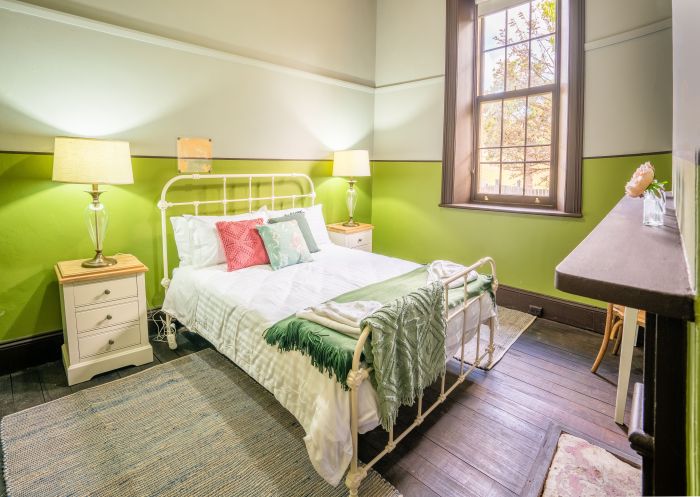 A rustic bedroom interior featured in the Post Office Residence, Hill End - Credit: John Spencer | DCCEEW