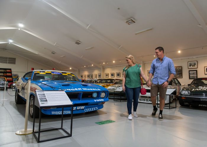 Family enjoying the National Motor Racing Museum located at Murray's Corner, Mount Panorama, Bathurst
