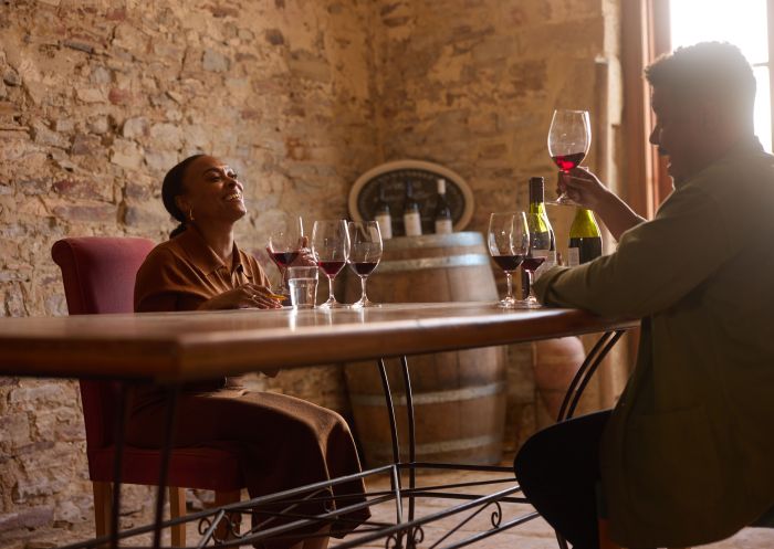Couple enjoying a wine tasting at De Beaurepaire Wines, Rylstone