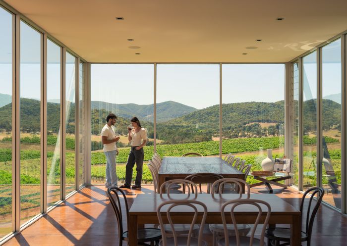 Couple enjoying a glass of wine at Logan Wines, Apple Tree Flat