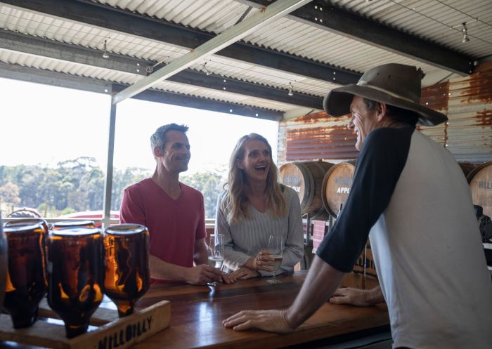 Couple enjoying tastings at Hillbilly Cider, Bilpin