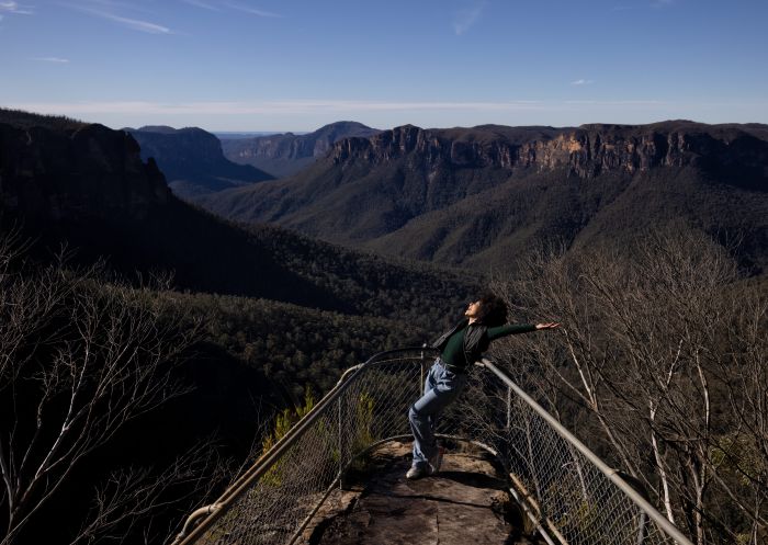 Woman enjoying Govetts Leap Lookout, Blackheath