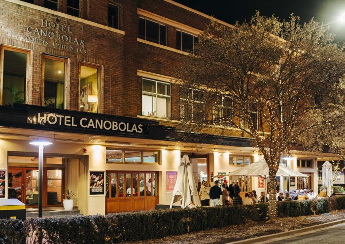 The front facade of Hotel Canobolas lit up at night, Orange - Credit: Hotel Canobolas