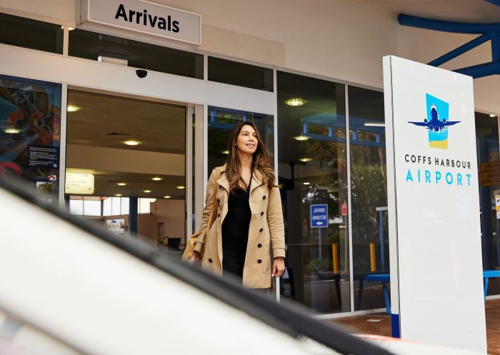 Woman arriving at Airport, Coffs Harbour Airport, Coffs Harbour