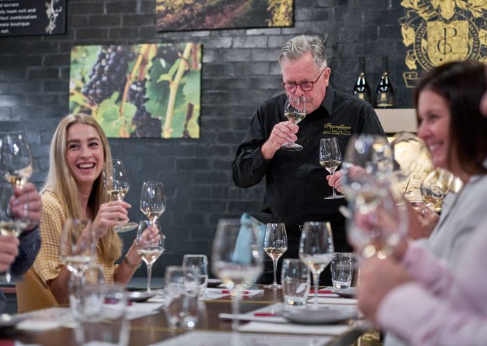 People enjoying a curated aesthetically pleasing wine-tasting experience at PepperGreen Estate, Berrima