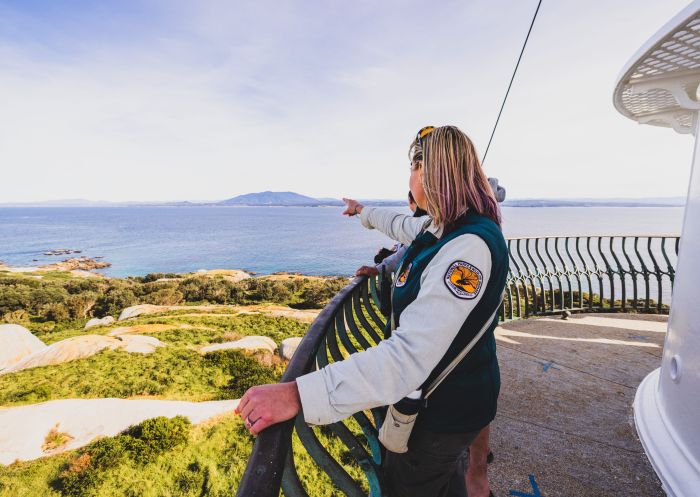 Guests exploring the Montague Island lighthouse on a Narooma Charters Montague Island Tour