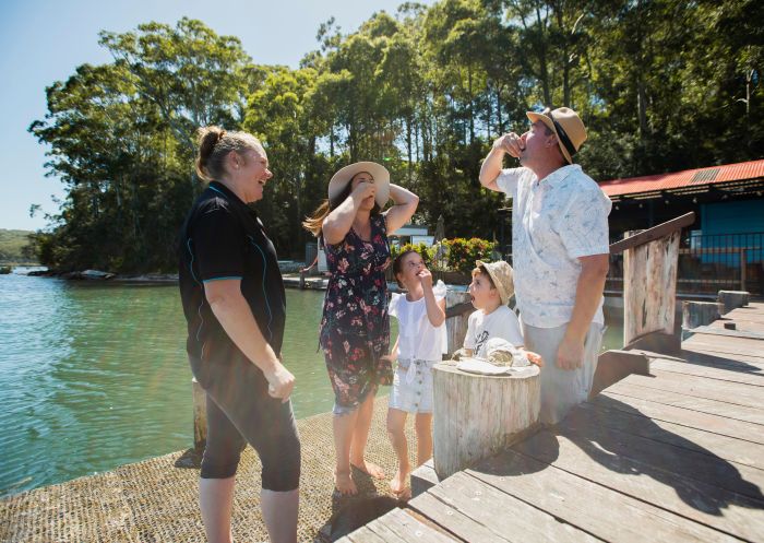 Family enjoying a visit to the Oyster Shed on Wray Street in Batemans Bay