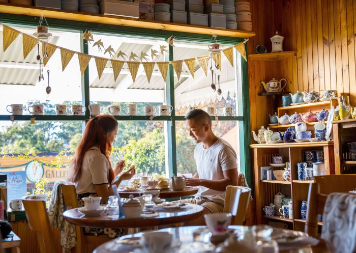 Couple in cafe, Eumun Tea, Central Tilba