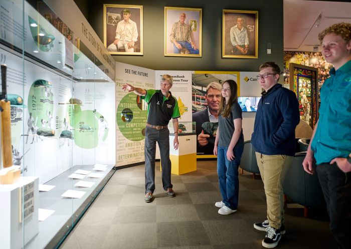 Families explore the Bradman Museum in Bowral, a permanent cultural exhibition dedicated to the game of cricket