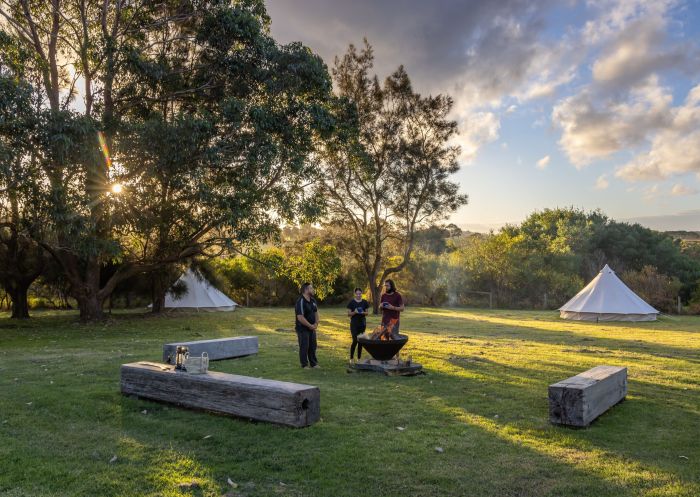 People enjoying an immersive experience with a welcome to Yuin country, including language, song and smoking ceremony, Ngaran Ngaran Culture Awareness, Eurobodalla