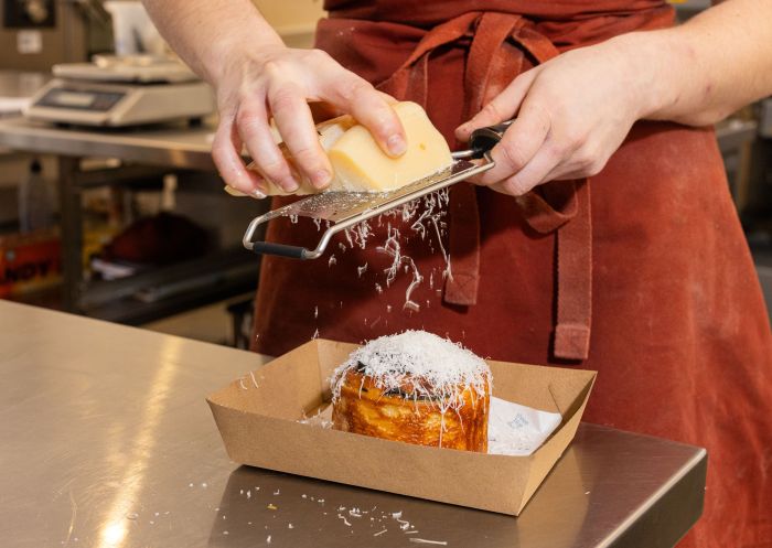 Grating cheese, Three Blue Ducks, Burradoo - Credit: Kitti Gould