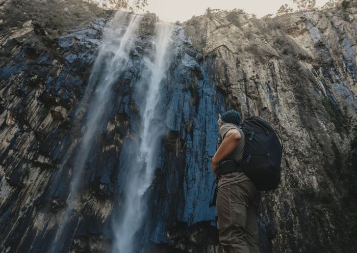 Couple looking at falls, Minyon Falls, Nightcap National Park - Credit: Visit Lismore